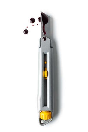 Bloody clerical knife isolated on white background.の写真素材