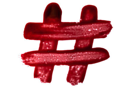 Painted in bloody paint symbol sign of hashtag, hash, isolated on white background.の写真素材