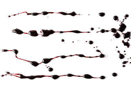 Bloody drops and drips isolated on white background.の写真素材