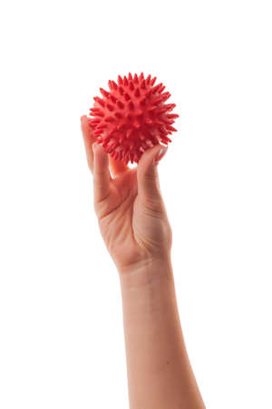 Female young hand holding a virus isolated on white background. Concept of immunity to coronavirus in young people.の写真素材