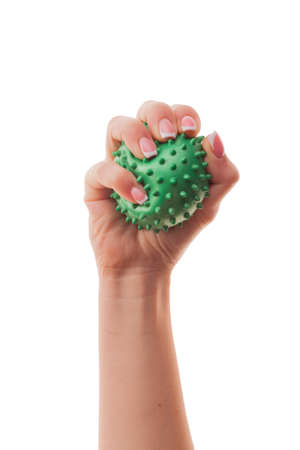 Female young hand holding a virus isolated on white background. Concept of immunity to coronavirus in young people.の写真素材