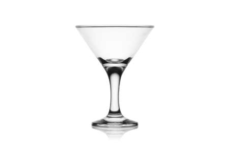 Empty martini glass isolated on a white background without glare. Reflection on the surface. Back light.の写真素材