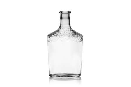 Empty cognac bottle glass isolated on a white background without glare. Reflection on the surface. Back light.の写真素材