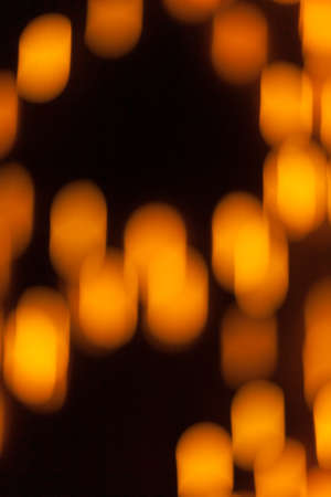 Festive garland bokeh background defocused. Background for greeting cards and postcards. Round bokeh balls. Round bokeh light.の写真素材
