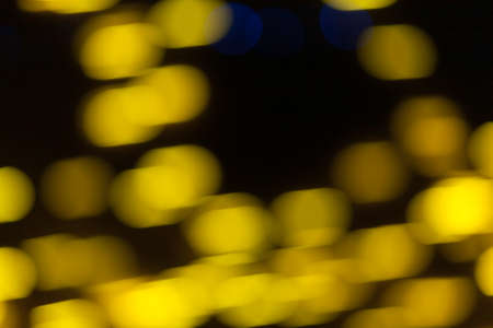 Festive garland bokeh background defocused. Background for greeting cards and postcards. Round bokeh balls. Round bokeh light.の写真素材