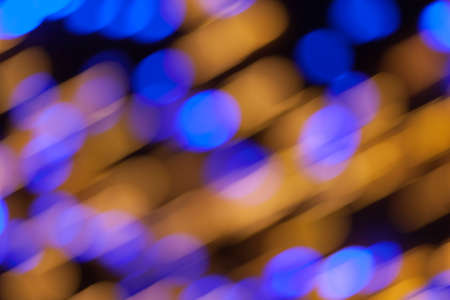 Festive garland bokeh background defocused. Background for greeting cards and postcards. Round bokeh balls. Round bokeh light.の写真素材