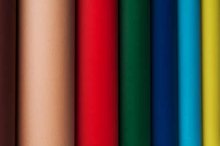 Colored paper in rolls multicolored cylindrical cardboard.の写真素材