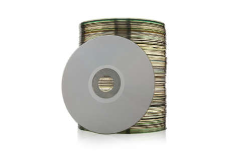 Stack of CD or DVD disk isolated on white background. Set collection pile of discs. Heap of data, information concept. Old technology.の写真素材