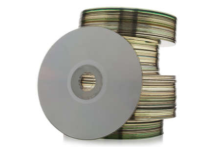 Stack of CD or DVD disk isolated on white background. Set collection pile of discs. Heap of data, information concept. Old technology.の写真素材