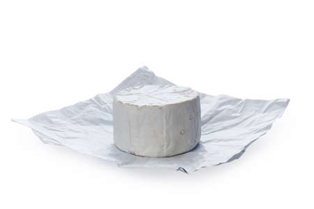 Camembert moldy cheese isolated on white background. Mixture of camembert brie and blue mold.の写真素材