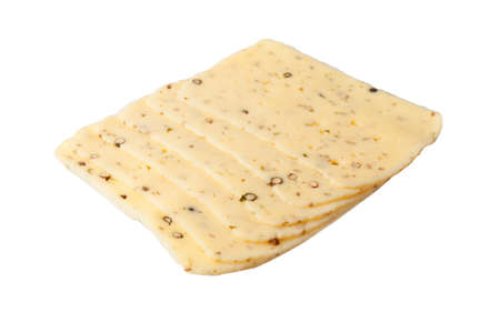 Slice of spiced cheese black pepper with peas isolated on a white background.の写真素材