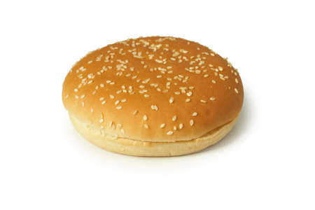 Round burger bun with sesame seeds isolated on white background.の写真素材