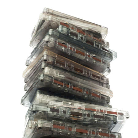 Collection of music cassettes stack isolated on white background.の写真素材