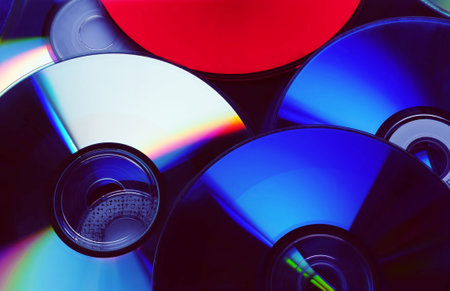 Group CD compact disc background close up.