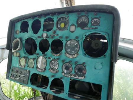 Old military abandoned helicopter. Broken non-working helicopter green.