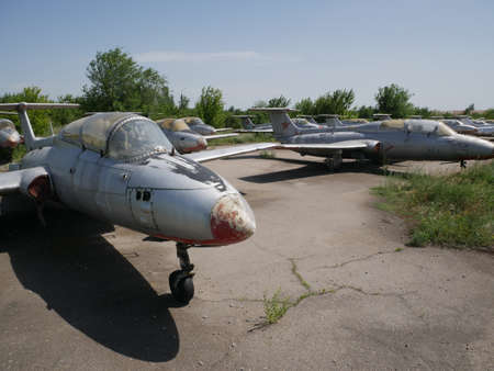 Military fighter plane old abandoned broken. Military abandoned equipment.の写真素材