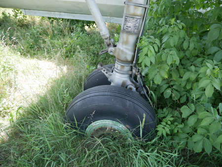 Old abandoned passenger plane. There is a broken plane in the wasteland.の写真素材