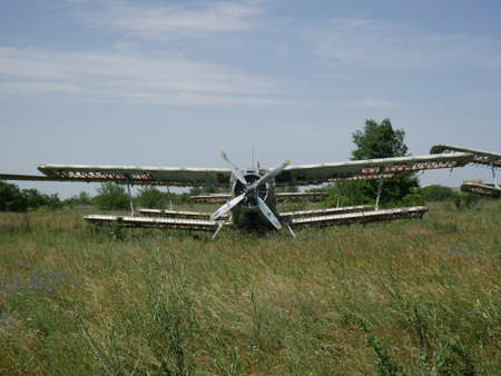 Old abandoned passenger plane. There is a broken plane in the wasteland.の写真素材