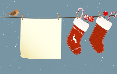 Christmas socks full of candies hanged on a clothesline next to a piece of paperのイラスト素材
