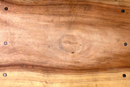 Wooden background and nailの写真素材