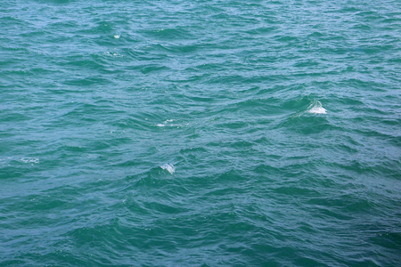 Wide large blue wave sea view, glitter green ripple ocean surface, river texture background, water lake pattern backdrop, nature seascape wallpaper, fresh marine landscape, cyan aqua panorama bannerの写真素材