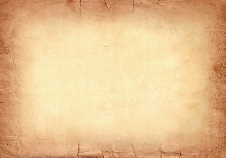 Brown old paper abstract sepia grunge background, yellow tear letter banner, vintage dotted dust document backdrop, sepia retro crack carton surface texture.の写真素材