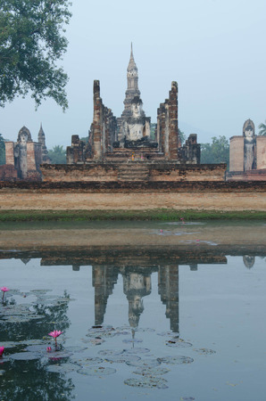 thai temple with sky and lakeの写真素材