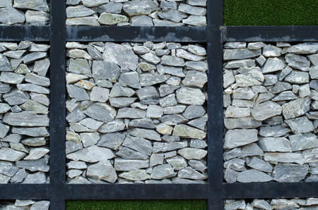 The stone and green grass on the wallの写真素材