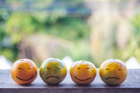 Smile and sad orangeの写真素材