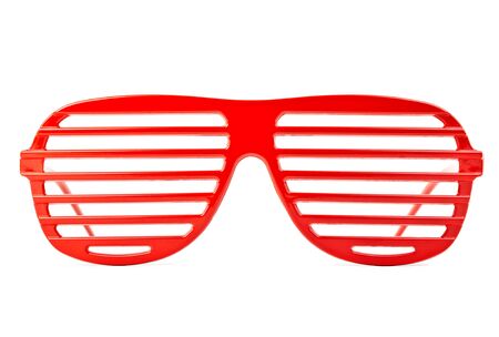 red plastic shutter shades sunglasses isolated on white backgroundの写真素材