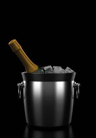 champagne bottle in bucket with ice isolated on black backgroundの写真素材