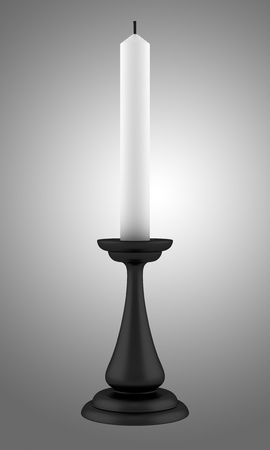 black candlestick with candle isolated on gray backgroundの写真素材