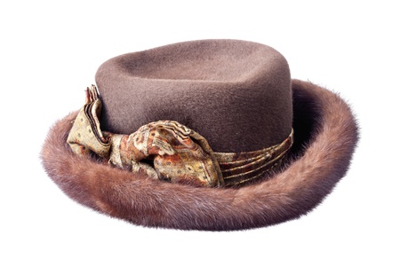 brown female fur hat isolated on white backgroundの写真素材