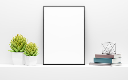 Black picture frame mock up and green potted plants on white shelf.の写真素材