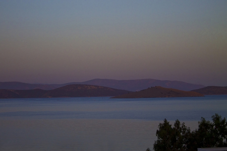 Evening view of the sea and mountainsの写真素材