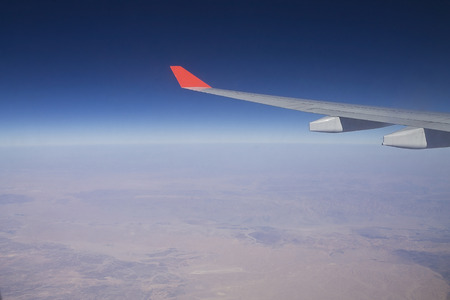 land and clouds from the airplaneの写真素材