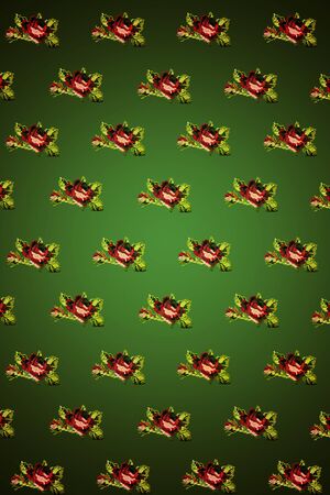 green background with a pattern of rosesの写真素材