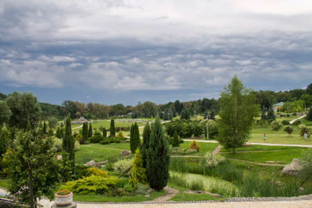 summer park Feofania in Kiev before the stormの写真素材