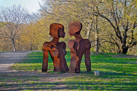 sculpture man and woman in Kiev parkの写真素材