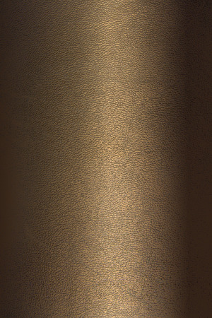 background leather texture bronze color vertical positionの写真素材