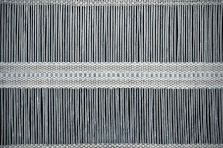 background gray straw mat with braid close upの写真素材