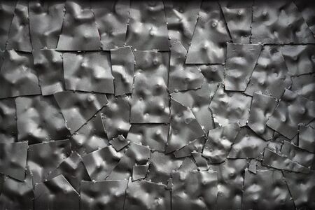 Background of the metal plates of irregular shape closeupの写真素材