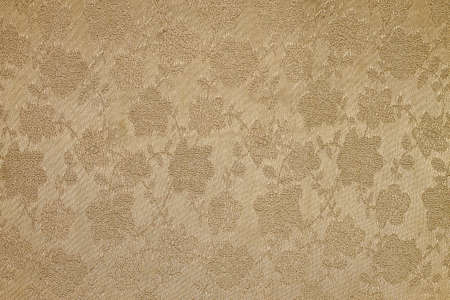 beige background Satin fabric with floral pattern closeupの写真素材