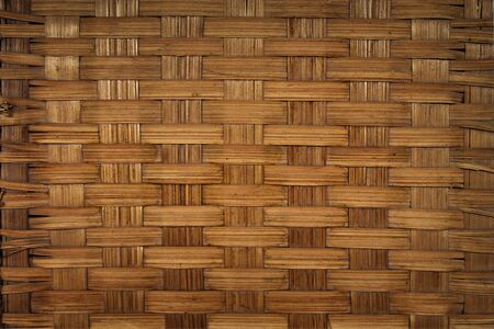 background wicker wood surface close up golden brownの写真素材