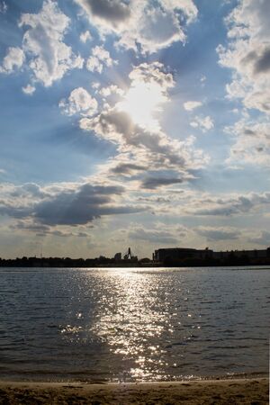 cloudy sky and the sunset on the Dnieper Riverの写真素材