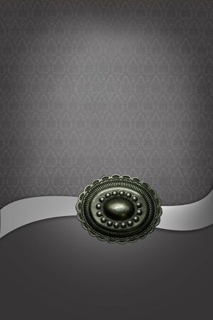 gray background with a pattern and metal ornamentsの写真素材