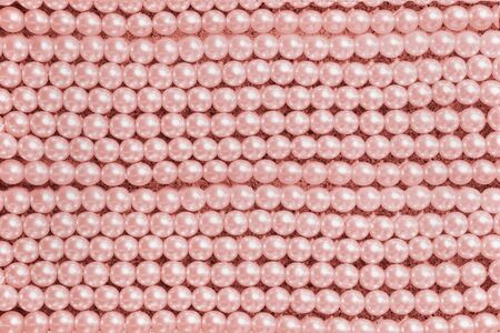 background string of  large pink pearls closeupの写真素材