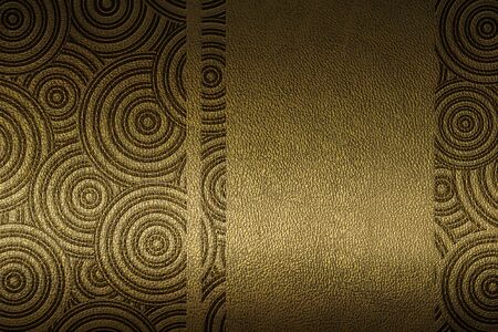 golden texture of leather with embossed patten closeupの写真素材