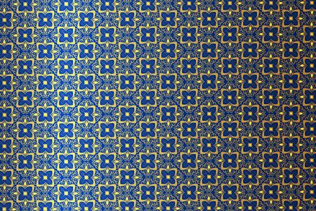 blue and yellow background with painted flower patternの写真素材