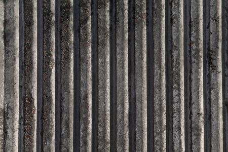 rippled texture of gray concrete wall closeupの写真素材